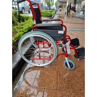 Self-Propelling Wheelchair